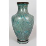 AN EARLY 20TH CENTURY CHINESE BLUE GROUND CLOISONNE VASE, decorated with a design of formal