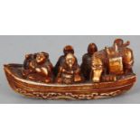 A GOOD QUALITY SIGNED JAPANESE MEIJI PERIOD IVORY NETSUKE, carved in the form of four of the Lucky
