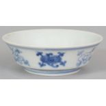 AN UNUSUAL SMALL SHALLOW CHINESE BLUE & WHITE PORCELAIN BOWL, the flaring sides decorated with ruyi,