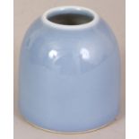 A CHINESE CLAIRE-DE-LUNE BEEHIVE PORCELAIN WATER POT, the even glaze thinning at the top rim, the