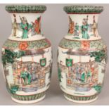 A GOOD LARGE MIRROR PAIR OF 19TH CENTURY CHINESE FAMILLE VERTE PORCELAIN VASES, each painted with