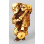 A GOOD QUALITY JAPANESE MEIJI PERIOD STAINED IVORY NETSUKE OF A MONKEY PERFORMER, unsigned, the