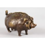 A BRONZE PIG TABLE BELL. 6ins long.