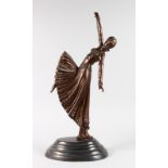 AFTER CHIPARUS A LARGE BRONZE DANCER on a stepped metal base. 26ins high.
