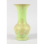 A FRENCH SPECKLED GREEN VASE with gilt decoration. 10ins high.