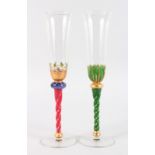 TWO GOOD VENETIAN TALL GLASS AND ENAMEL DECORATED CHAMPAGNE FLUTES.