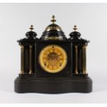 A GOOD 19TH CENTURY BLACK MARBLE SERPENTINE FRONTED CLOCK, with eight columns and eight-day