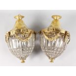 A GOOD PAIR OF CRYSTAL AND GILT METAL PINEAPPLE HANGING LIGHTS. 16ins high.