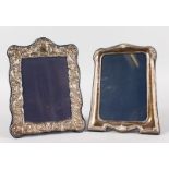 TWO UPRIGHT PHOTOGRAPH FRAMES, 7ins x 5.5ins.