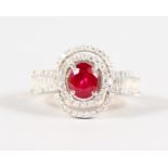 A GOOD 18CT YELLOW AND WHITE GOLD, RUBY AND DIAMOND DRESS RING.