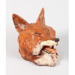 A PAINTED COLD CAST BRONZE FOXES HEAD INKWELL. 3.5ins.