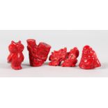 FOUR VARIOUS RED CORAL CARVED FIGURES.