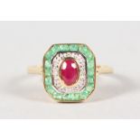 A 9CT GOLD EMERALD, RUBY AND DIAMOND DECO DESIGN RING.