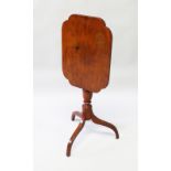 A 19th CENTURY MAHOGANY TILT TOP TRIPOD TABLE with shaped top, turned centre support ending in
