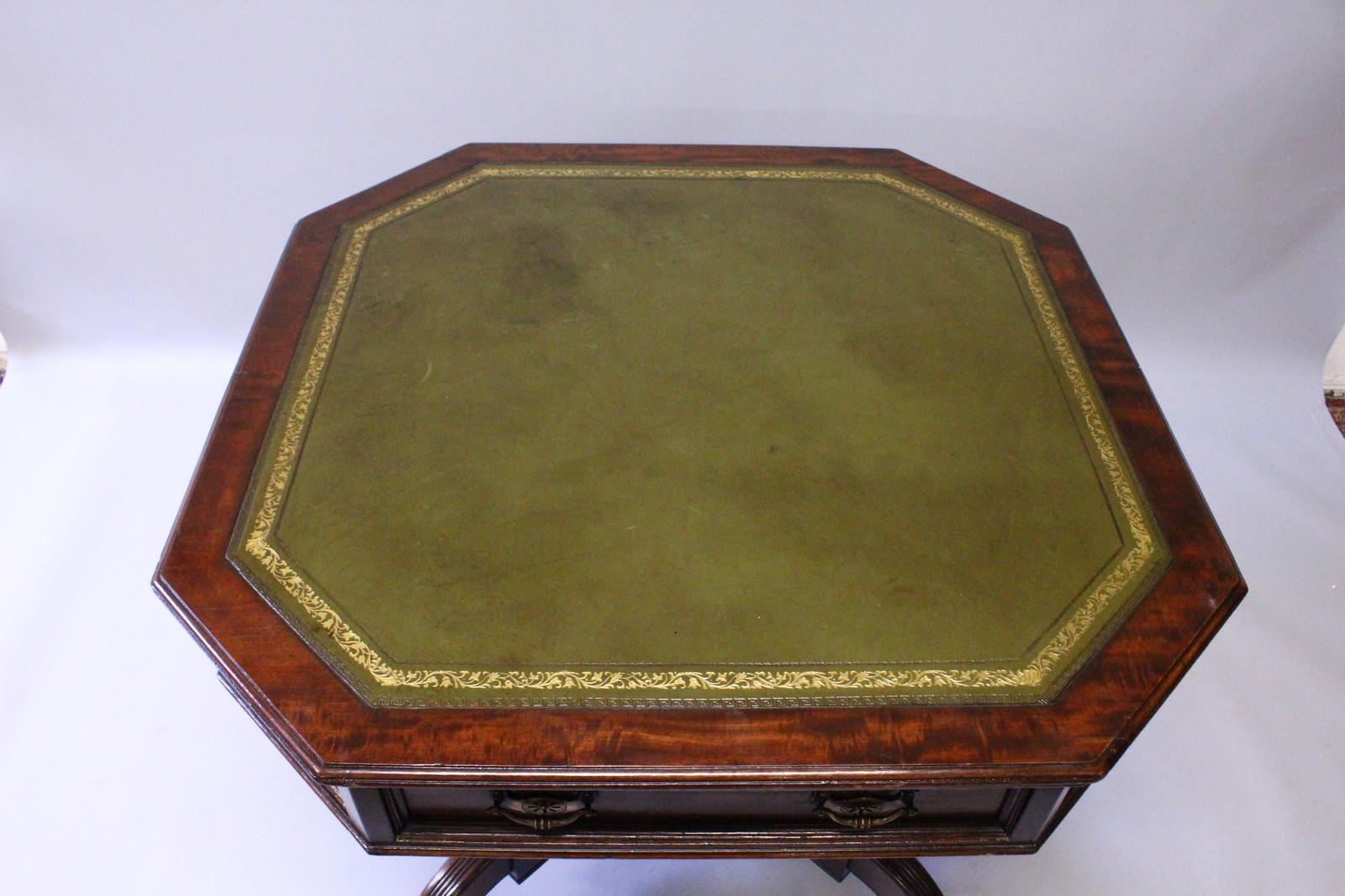 A MAPLE & CO AESTHETIC MAHOGANY OCTAGONAL DRUM TABLE with green leather top, two frieze drawers, - Image 2 of 4