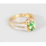 A VERY PRETTY 14CT YELLOW GOLD, TOURMALINE AND DIAMOND RING.