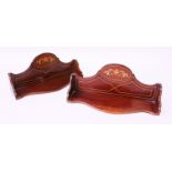 A SMALL PAIR OF VICTORIAN MAHOGANY SERPENTINE FRONTED OPEN SHELVES. 1ft wide.