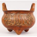 A GOOD CHINESE BRONZE ARABIC TWO-HANDLED CENSER. Six character mark. 7.5ins diameter.