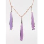 AN AMETHYST AND SILVER TRIPLE DROP NECKLACE.