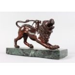 AFTER THE ANTIQUE A BRONZE CHIMAERA, on a marble base. 11ins long.