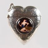 AN ENGRAVED HEART SHAPED VESTA with a circular plaque of a semi nude.