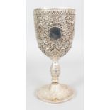A GOOD LARGE INDO-PERSIAN SILVER-METAL GOBLET, weighing 785gm, pierced and embossed with animals and