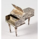 A FRENCH SILVER MINIATURE PIANO. 2.5ins long.