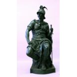 A LARGE BRONZE OF A SEATED ROMAN SOLDIER, his helmet with a winged dragon, holding a sword by his