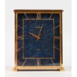 A GOOD JAEGER-LECOULTRE ELECTRIC CLOCK with Lapis Lazuli face.