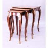 A GOOD NEST OF THREE LINKE MODEL FRENCH TABLES with parquetry tops, gilt mounts and curving legs.