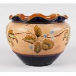 A ROYAL DOULTON STONEWARE JARDINIERE with waved rim and a band of fruiting vines. 9ins diameter.