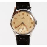 A GENTLEMAN'S 1930'S OMEGA WRISTWATCH with leather strap.