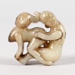 A GOOD CHINESE JADE EROTIC ROUNDEL.