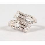 AN 18CT WHITE GOLD DOUBLE ROW DIAMOND SET RING.