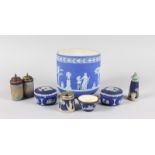 A WEDGWOOD JASPER WARE BLUE AND WHITE JARDINIERE, 6ins high, and seven small pieces of Jasper ware.