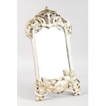 A SMALL SILVERED UPRIGHT MIRROR with classical figure. 20ins high.