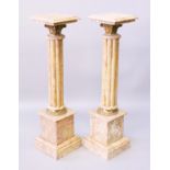 A GOOD PAIR OF BEIGE CLUSTER MARBLE COLUMNS with square tops and pedestal bases. 3ft 6ins high.