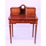 A LADIES 19TH CENTURY LOUIS XVI DESIGN DESK, the top inset with a clock and dummy books, leather