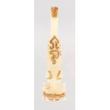 A GILDED WHITE JADE BELT HOOK. 5.5ins long.