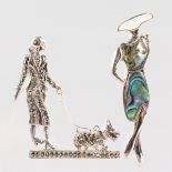 TWO SILVER ART DECO DESIGN BROOCHES of ladies.