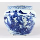A CHINESE BLUE AND WHITE JARDINIERE painted with a landscape scene. 9ins high.