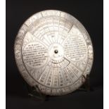 A CHRISTOFLE of FRANCE CIRCULAR CALENDER. 5.5ins diameter.