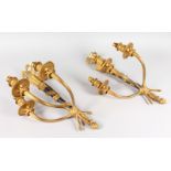 A GOOD PAIR OF EMPIRE ORMOLU THREE BRANCH WALL SCONCES with ribbon motif and curving branches. 20ins