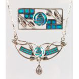 A SILVER AND ENAMEL CELTIC NECKLACE AND BROOCH.