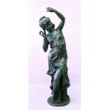 A LARGE LIFE SIZE BRONZE OF A YOUNG CLASSICAL LADY, in a dancing pose with arms up, standing on a