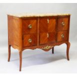 A LOUIS XVIth DESIGN BREAKFRONT TWO DRAWER COMMODE with marble top, ormolu handles, supported on