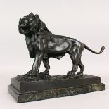 JULES MOIGNIEZ (1835-1894) FRENCH A GOOD BRONZE STANDING LION. Signed. 13ins long, on a