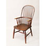 A SPINDLE BACK WINDSOR ARMCHAIR.
