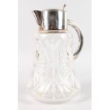 A GOOD CUT GLASS WATER JUG with plated mounts.