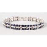 A GOOD SILVER, CUBIC ZIRCONIA AND SAPPHIRE DOUBLE ROW BRACELET.